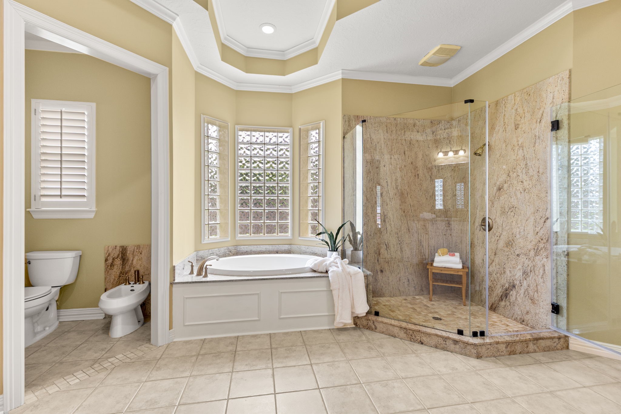 6610 Radley Drive Spring, TX 77379 - Photo 25 of 50 Solid marble shower walls, jetted soaking tub... all your spa day necessities await you.