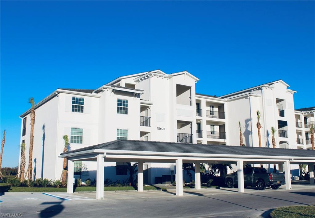 15405 Grn Acrs Avenue, Unit 2341 Babcock Ranch, FL 33982 - Photo 19 of 28 a view of city with large building
