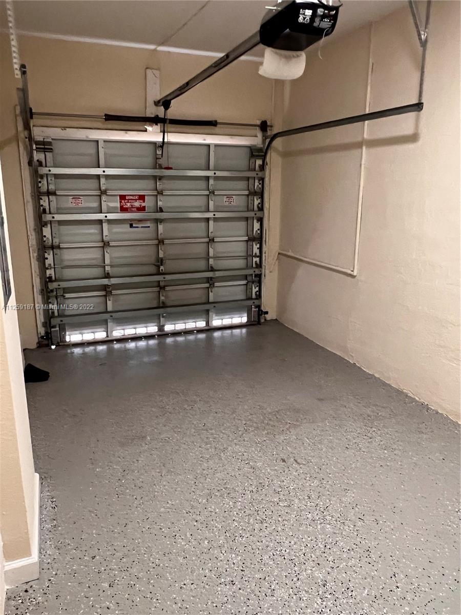 Three Lakes Miami, FL 33186 - Photo 16 of 23 a view of walk in closet with clothes