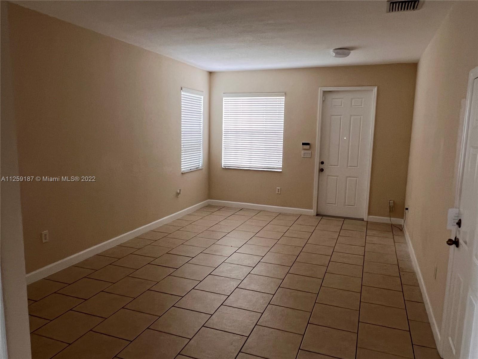 Three Lakes Miami, FL 33186 - Photo 17 of 23 a view of an empty room and window