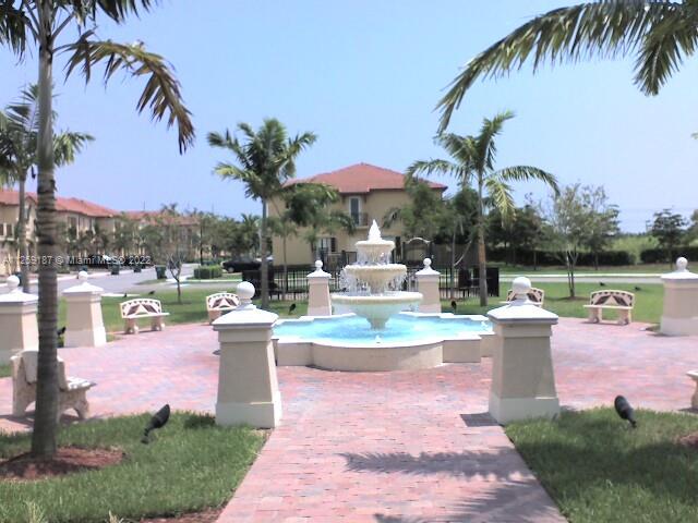 Three Lakes Miami, FL 33186 - Photo 7 of 23 a view of a backyard with a patio and plants