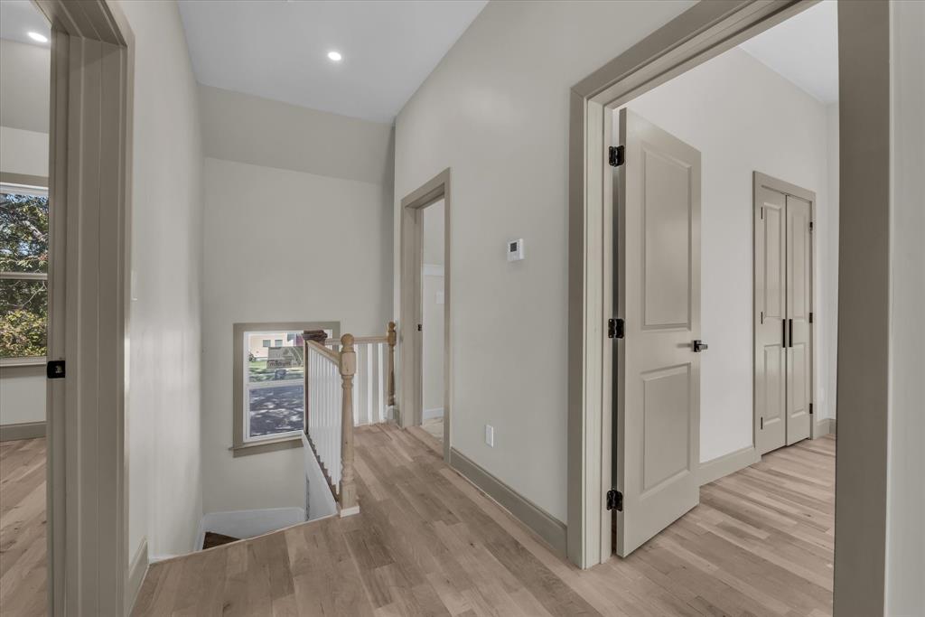 718 Tyler Street Waco, TX 76704 - Photo 17 of 39 a view of a hallway with wooden floor and entryway