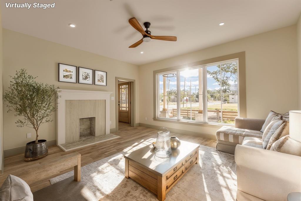 718 Tyler Street Waco, TX 76704 - Photo 6 of 39 a living room with furniture and a fireplace