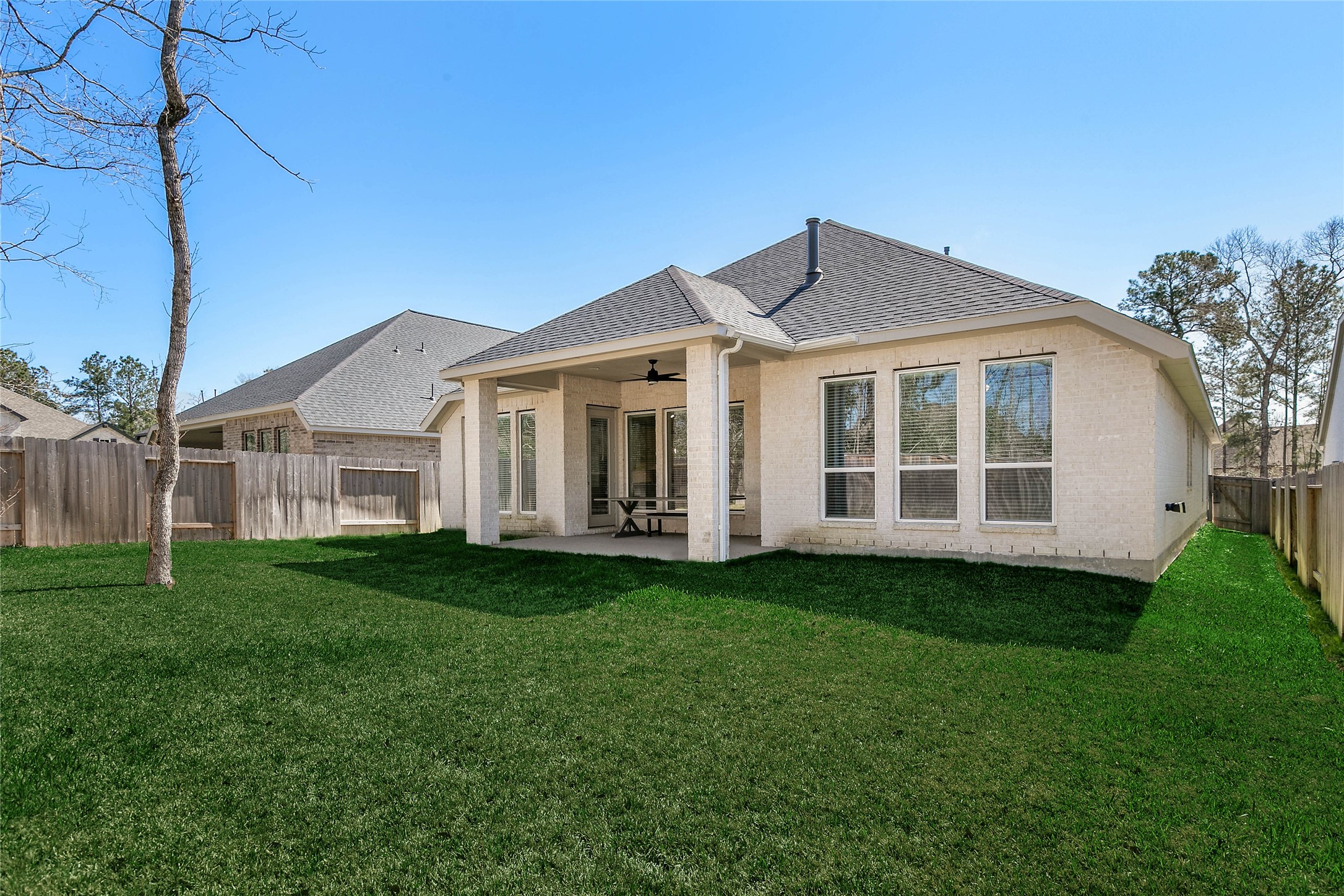 508 Stella Beth Way Montgomery, TX 77316 - Photo 24 of 27 a front view of a house with a garden