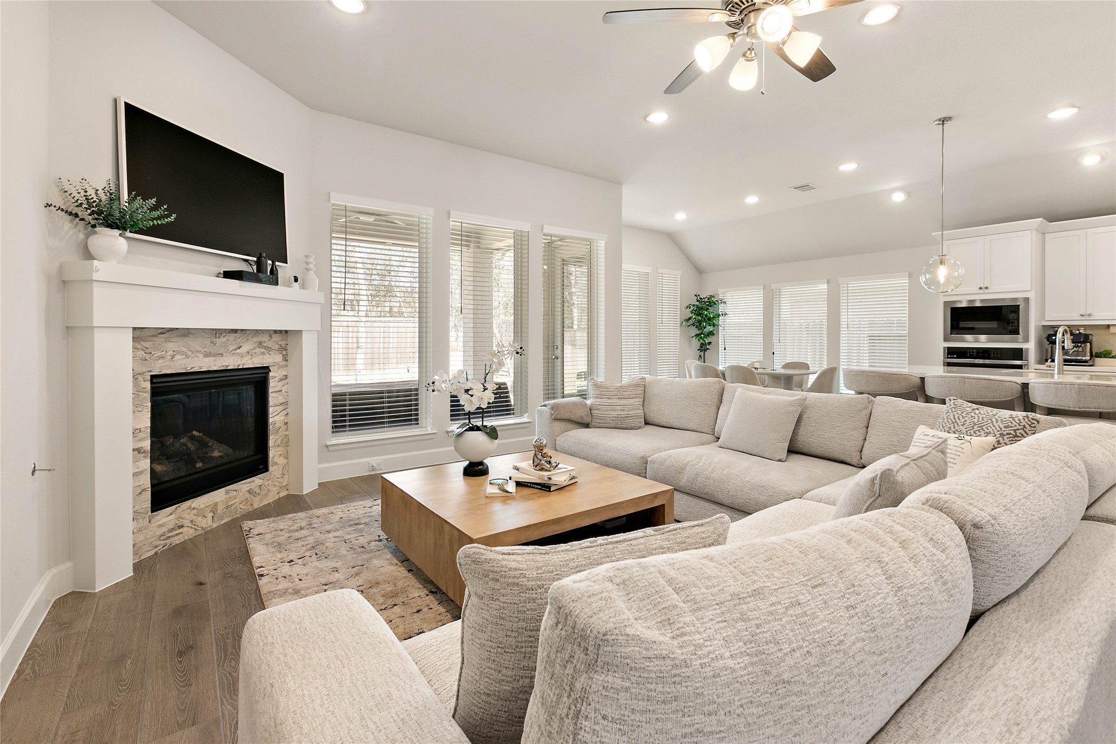 508 Stella Beth Way Montgomery, TX 77316 - Photo 8 of 27 a living room with furniture a fireplace and a flat screen tv