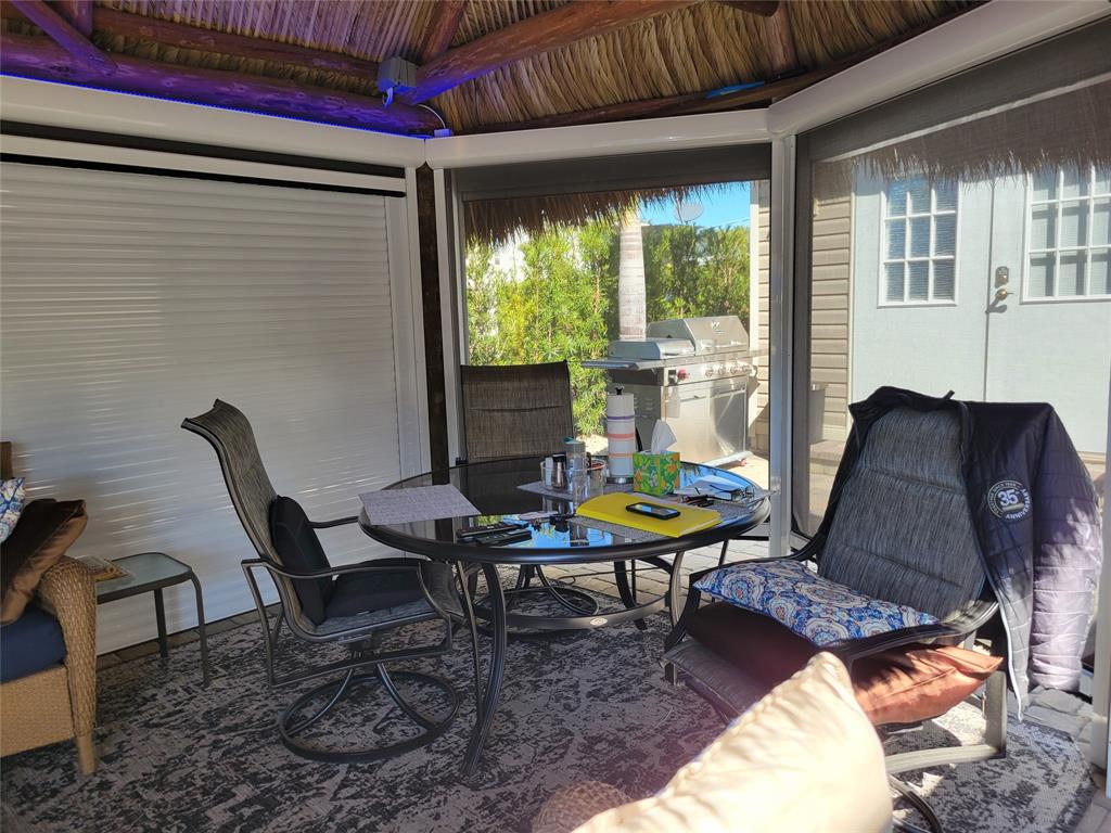 511 Southwest 39th Trace Okeechobee, FL 34974 - Photo 6 of 16 a view of a workspace with furniture and a window