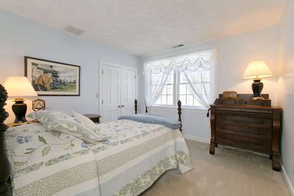 160 Elizabeth Ridge Road Carlisle, MA 01741 - Photo 17 of 23 a bedroom with a bed and a window