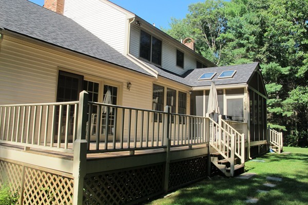 160 Elizabeth Ridge Road Carlisle, MA 01741 - Photo 23 of 23 a front view of a house with a yard