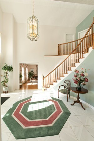 160 Elizabeth Ridge Road Carlisle, MA 01741 - Photo 3 of 23 a view of staircase with furniture and a rug