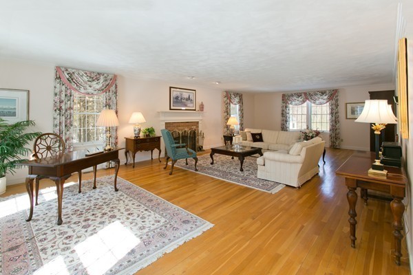 160 Elizabeth Ridge Road Carlisle, MA 01741 - Photo 4 of 23 a living room with furniture and a rug