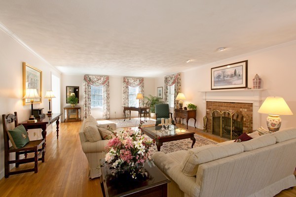 160 Elizabeth Ridge Road Carlisle, MA 01741 - Photo 5 of 23 a living room with furniture and a fireplace