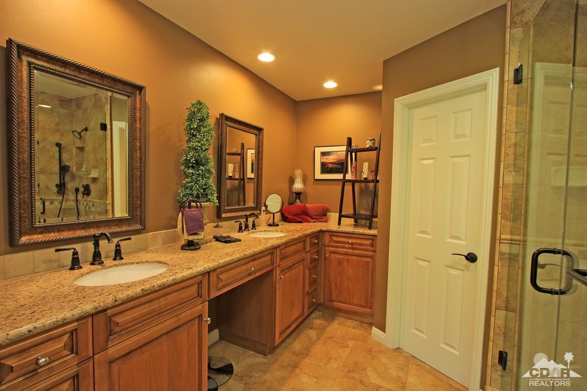 71391 Gardess Road Rancho Mirage, CA 92270 - Photo 33 of 53 a bathroom with a granite countertop sink mirror and double