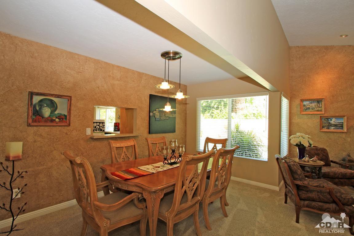 71391 Gardess Road Rancho Mirage, CA 92270 - Photo 8 of 53 a view of a dining room with furniture window and outside view