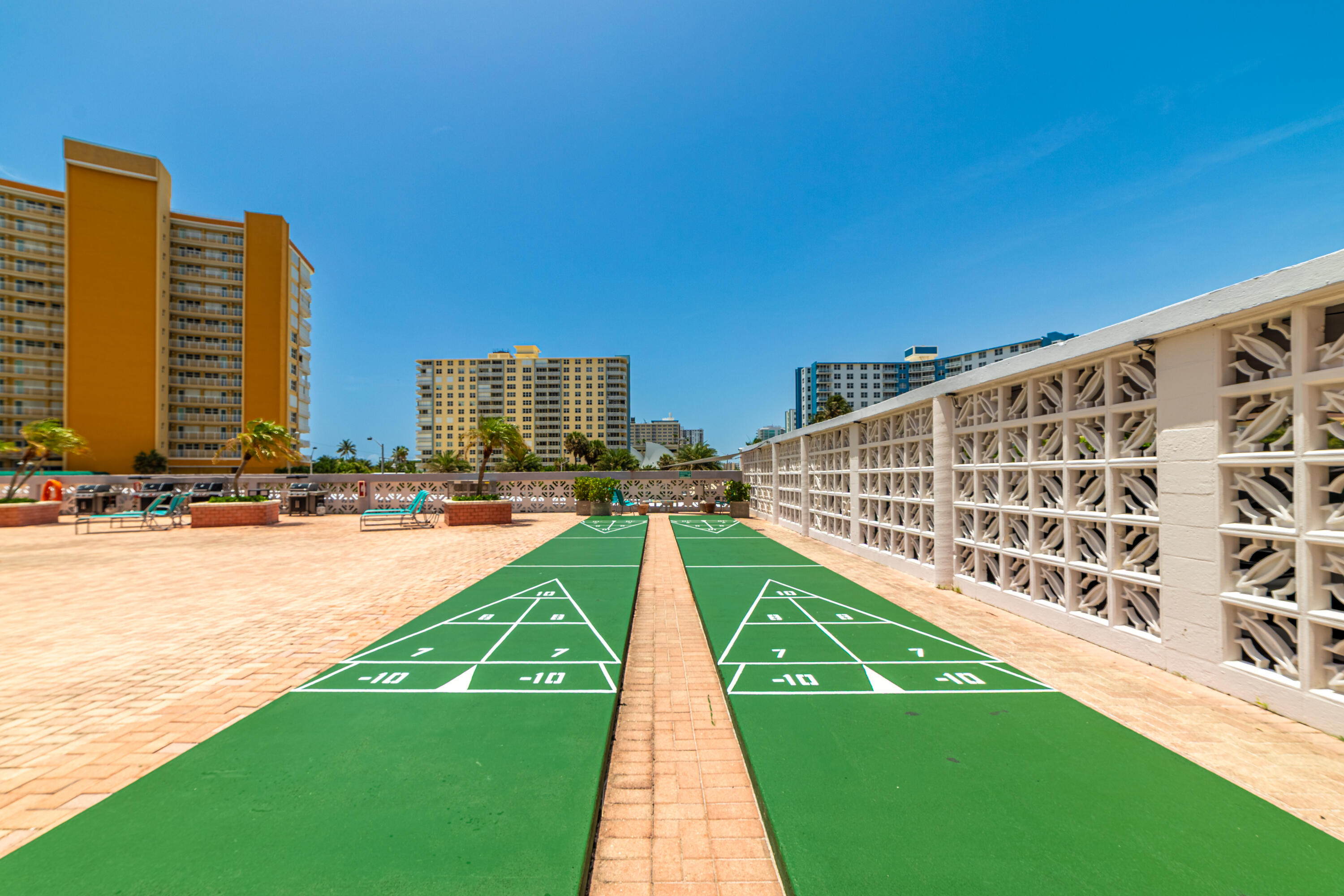 405 North Ocean Boulevard, Unit 507 Pompano Beach, FL 33062 - Photo 29 of 38 a view of swimming pool with a lawn chairs
