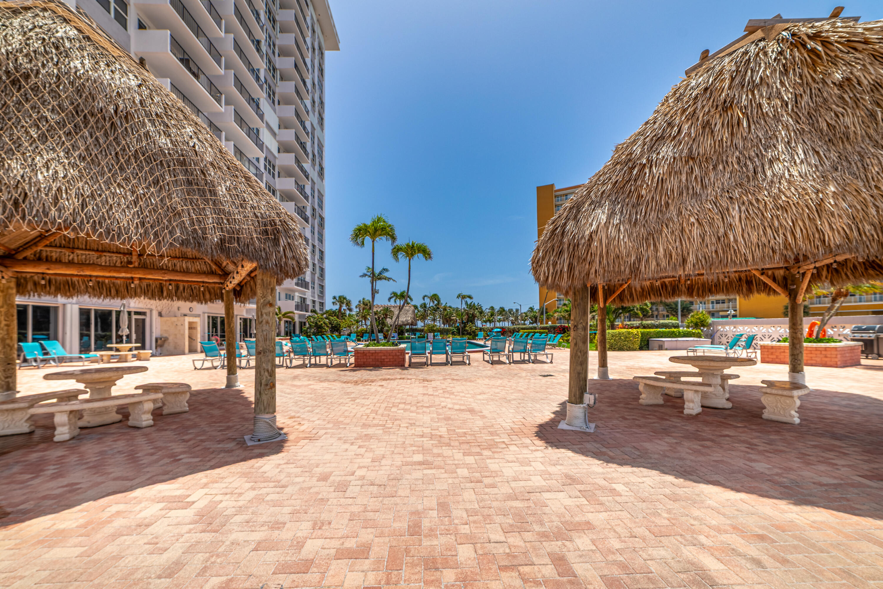 405 North Ocean Boulevard, Unit 507 Pompano Beach, FL 33062 - Photo 30 of 38 a view of a building with sitting area