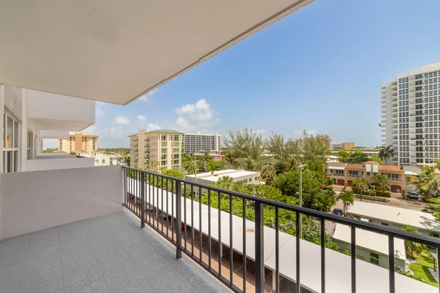 a view of an apartment with a garden and plants