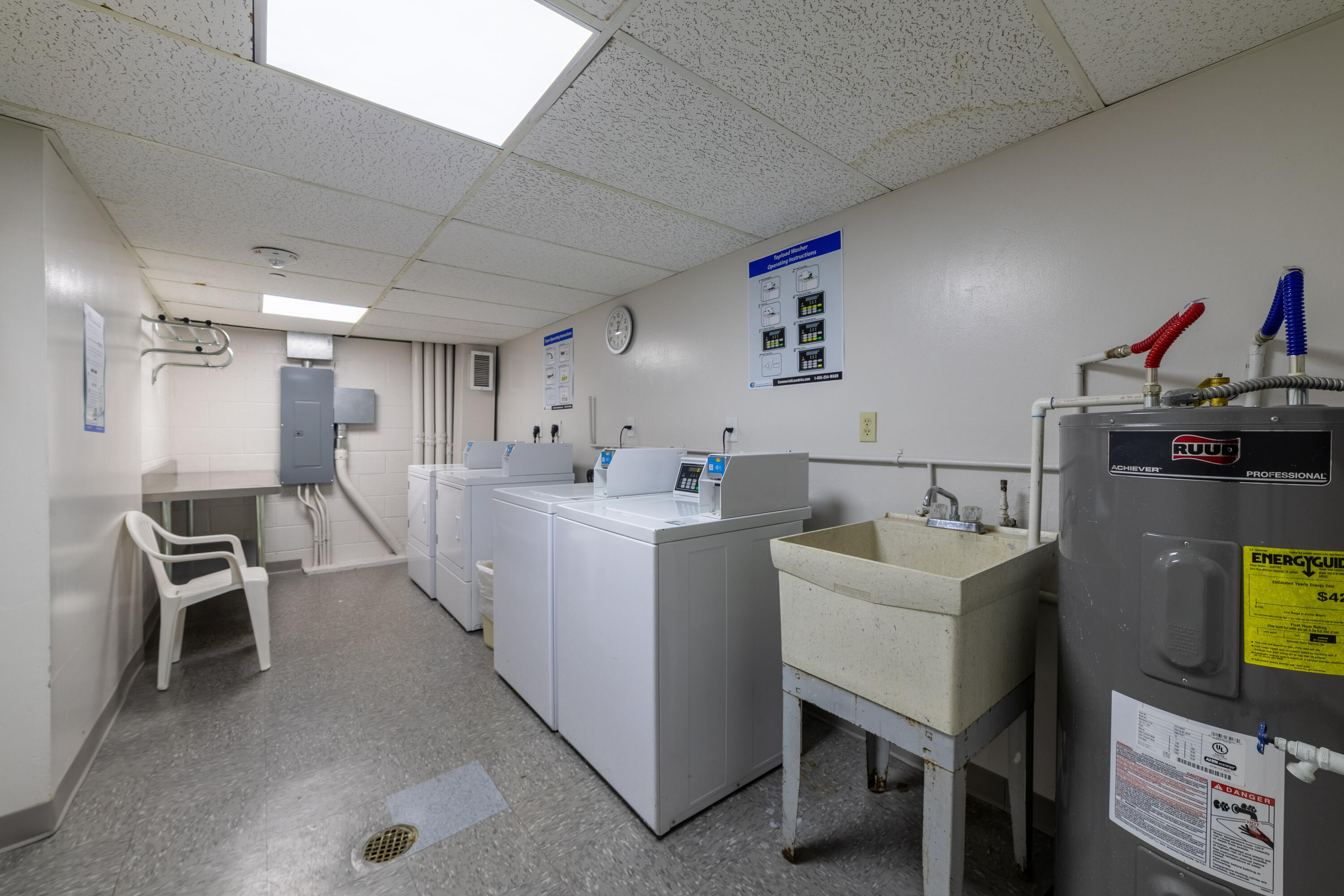 405 North Ocean Boulevard, Unit 507 Pompano Beach, FL 33062 - Photo 37 of 38 a view of a kitchen and utility room