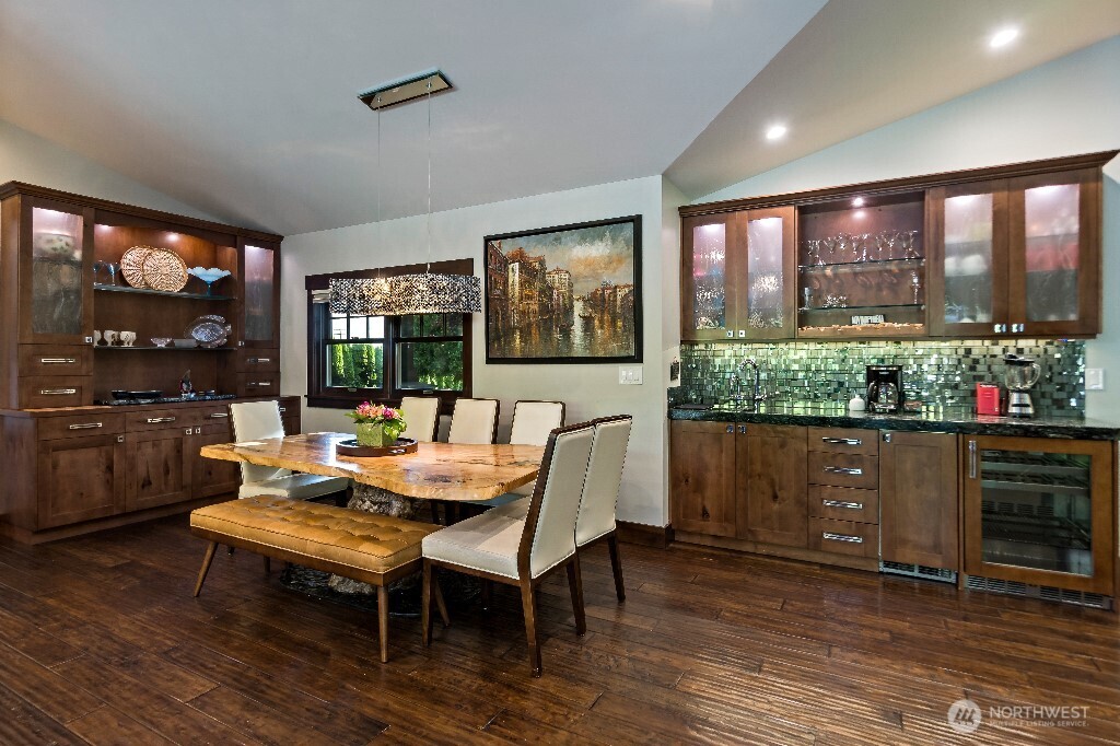 21713 45th Avenue Southeast Bothell, WA 98021 - Photo 12 of 40 a outdoor dining space with furniture and window