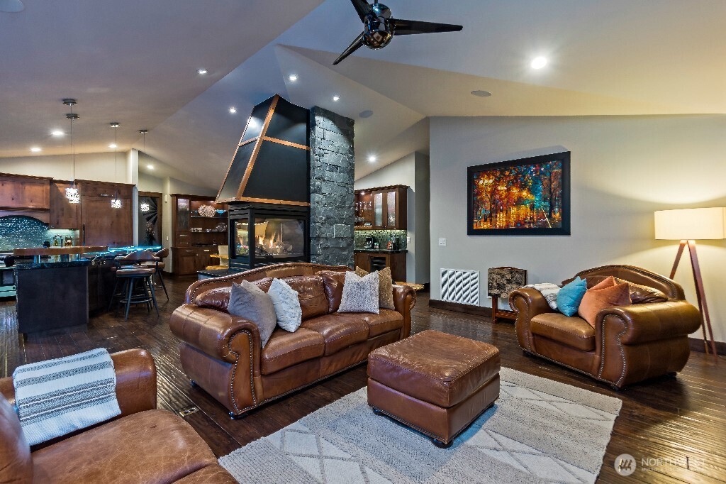 21713 45th Avenue Southeast Bothell, WA 98021 - Photo 15 of 40 a living room with furniture and a flat screen tv