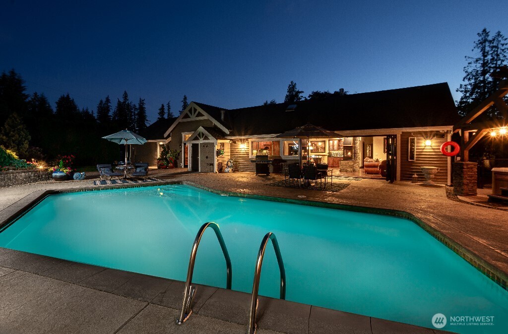 21713 45th Avenue Southeast Bothell, WA 98021 - Photo 24 of 40 a view of a chairs and table in the patio