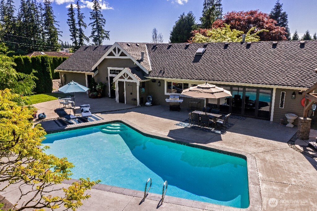 21713 45th Avenue Southeast Bothell, WA 98021 - Photo 3 of 40 an aerial view of a house with garden space and sitting area