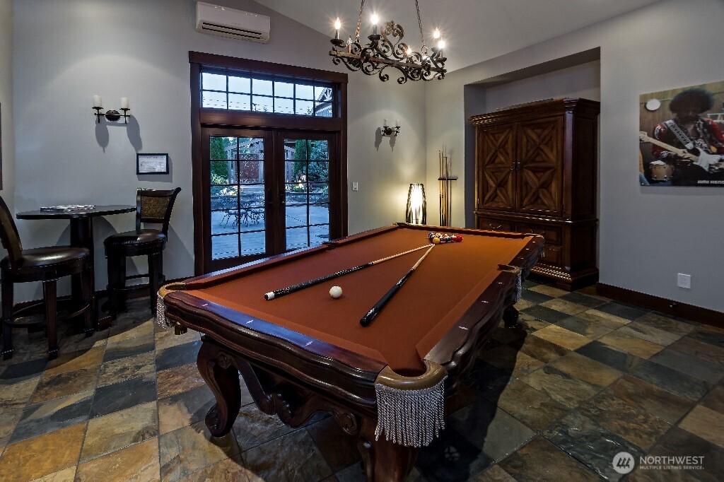 21713 45th Avenue Southeast Bothell, WA 98021 - Photo 8 of 40 a room with pool table and windows