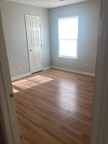 a stove top oven sitting inside of a kitchen