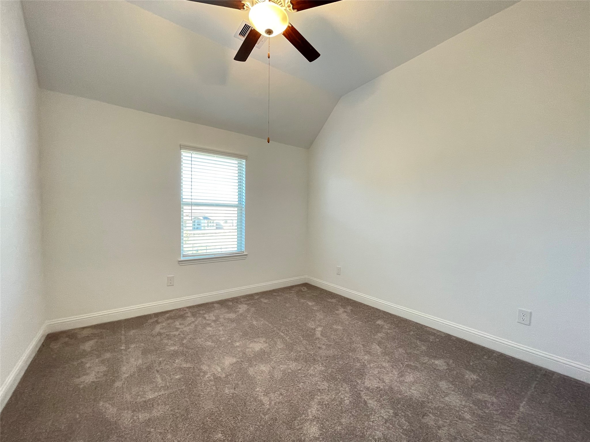 29806 Cherry Vine Road Katy, TX 77494 - Photo 21 of 30 an empty room with a window