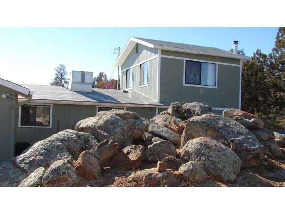 1810 Rocky Road Prescott, AZ 86305 - Photo 1 of 12 a black and white photo of a house