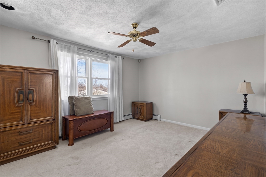 11 Clearview Road Stoneham, MA 02180 - Photo 17 of 42 a living room with furniture