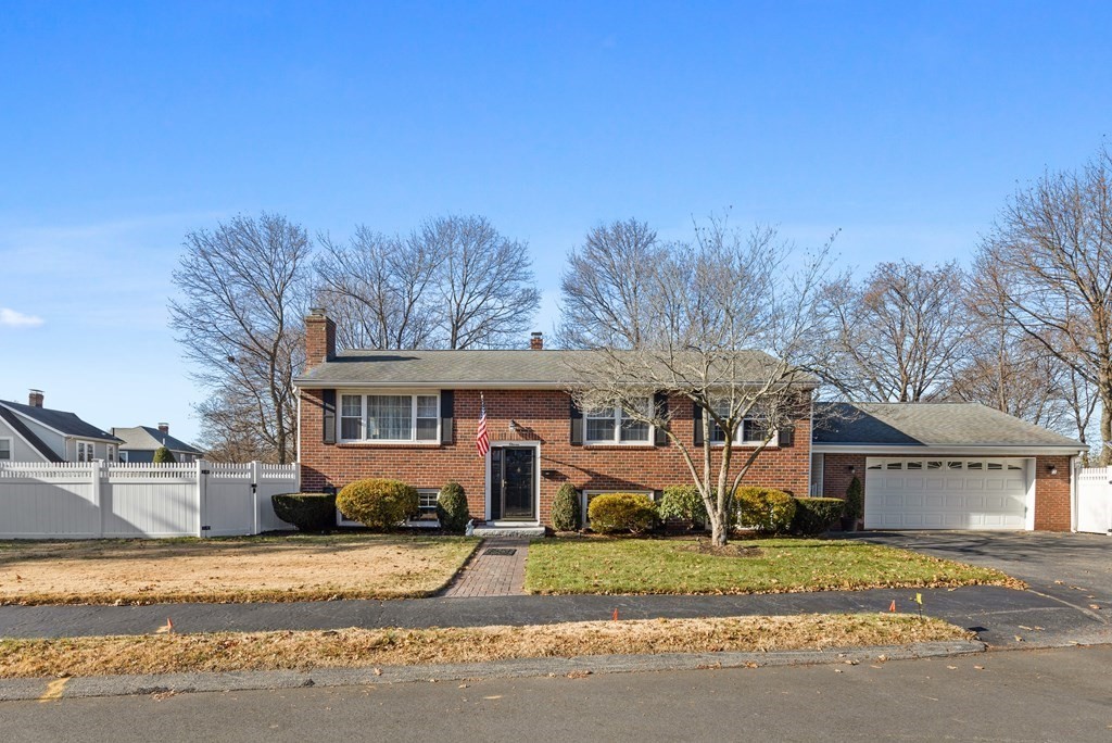 11 Clearview Road Stoneham, MA 02180 - Photo 2 of 42 front view of house with a yard