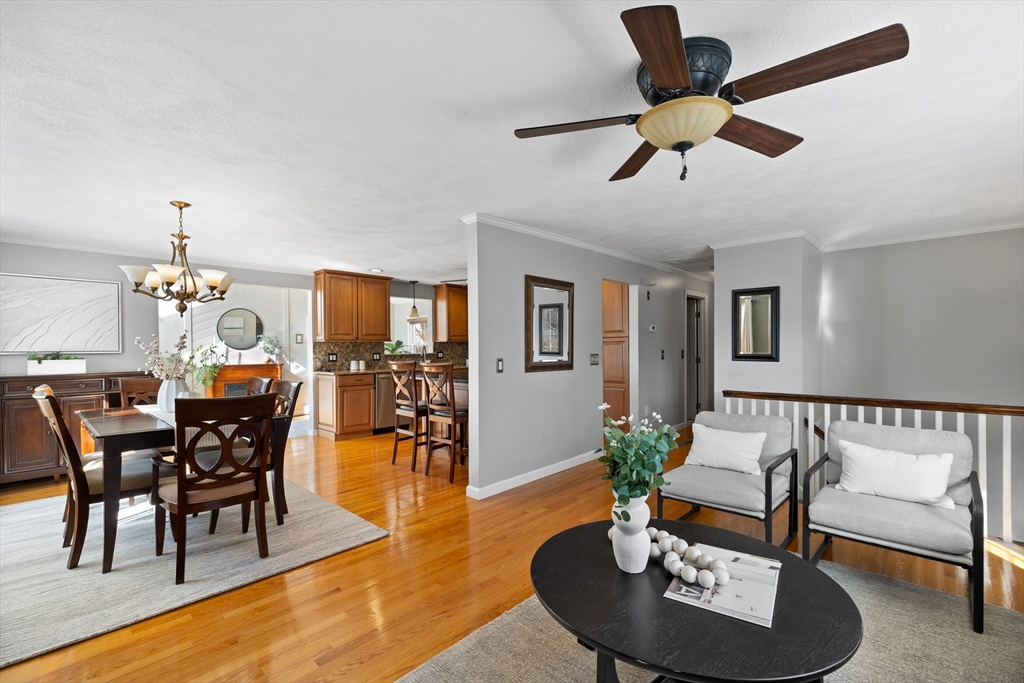 11 Clearview Road Stoneham, MA 02180 - Photo 6 of 42 a living room with furniture and a dining table