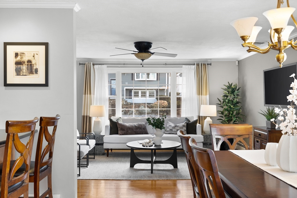 11 Clearview Road Stoneham, MA 02180 - Photo 7 of 42 a living room with furniture fireplace and a flat screen tv