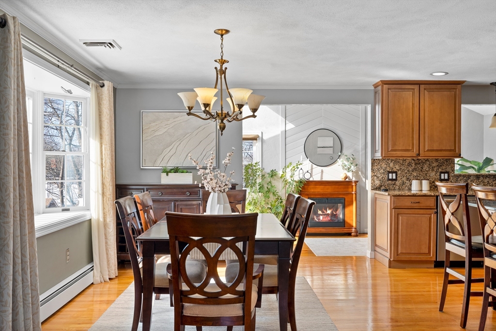 11 Clearview Road Stoneham, MA 02180 - Photo 10 of 42 a view of a dining room with furniture window and wooden floor
