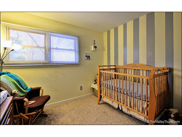 56 Sheffield Road Montgomery, IL 60538 - Photo 15 of 18 a view of a chairs and table in the balcony