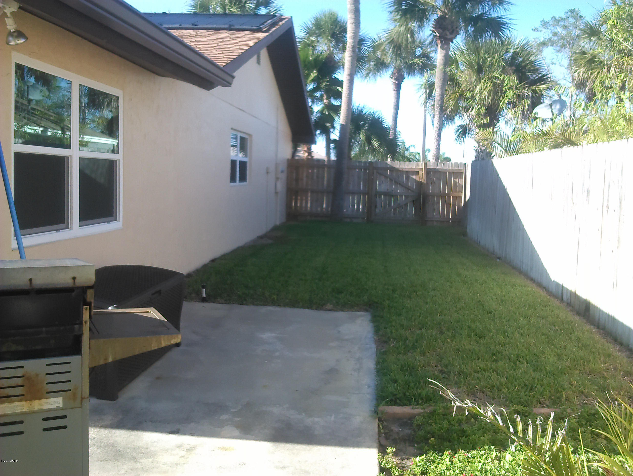 175 Sand Dollar Road Indialantic, FL 32903 - Photo 36 of 44 Side with grass