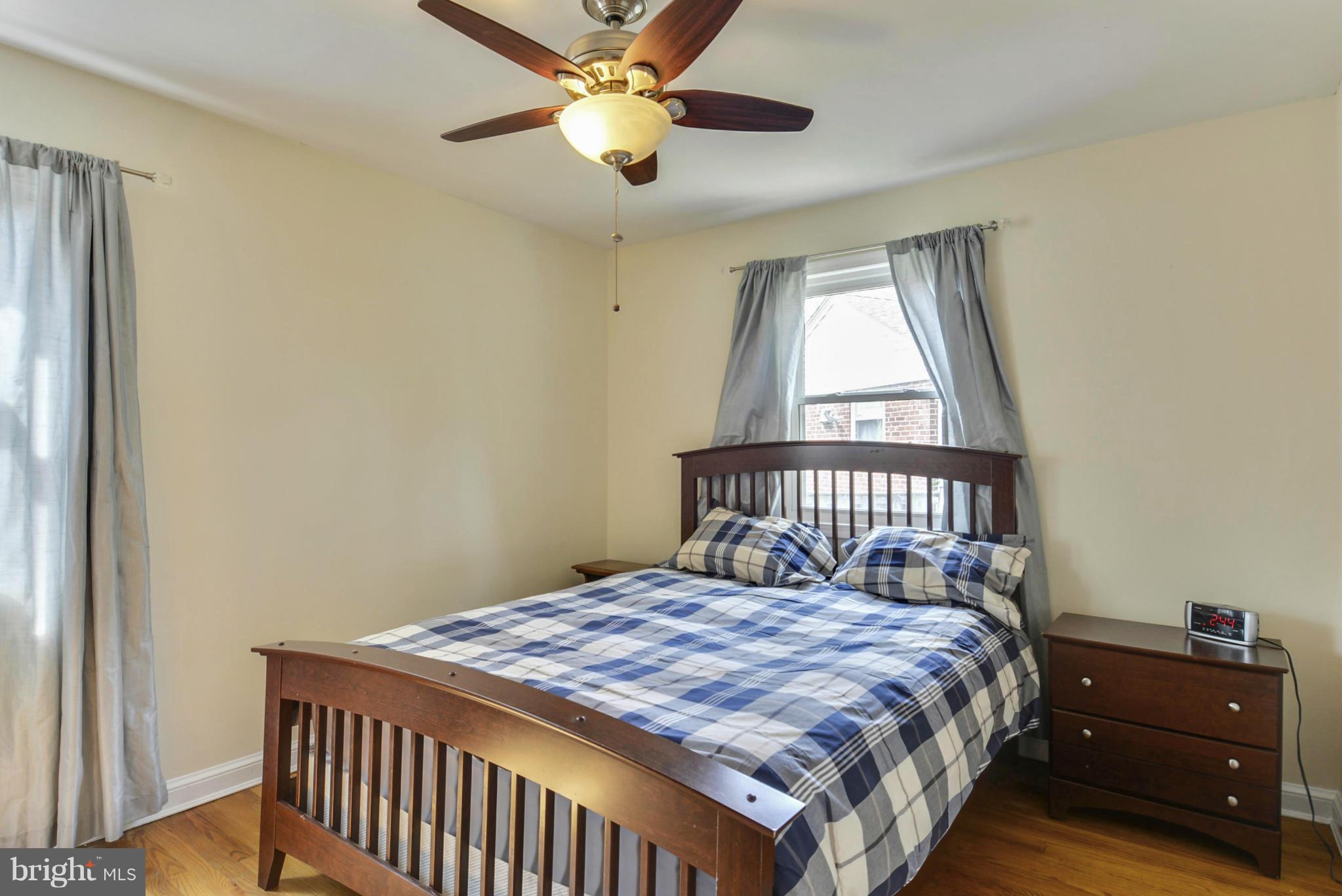 501 Royalton Road Silver Spring, MD 20901 - Photo 13 of 29 a bedroom with a bed and a window