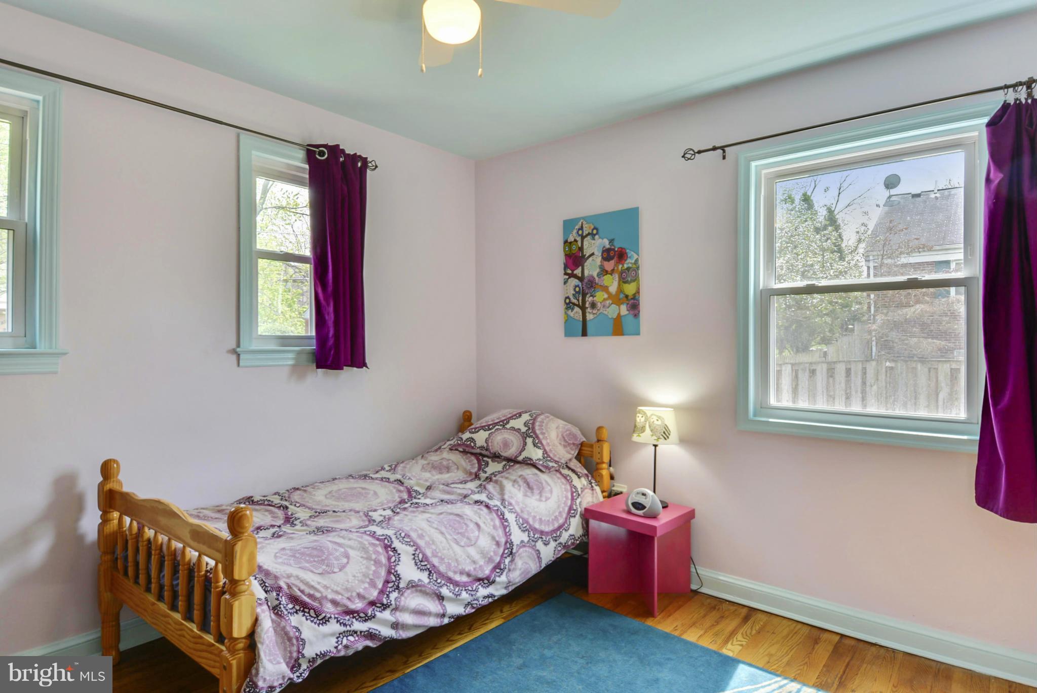 501 Royalton Road Silver Spring, MD 20901 - Photo 16 of 29 a bedroom with bed and a window