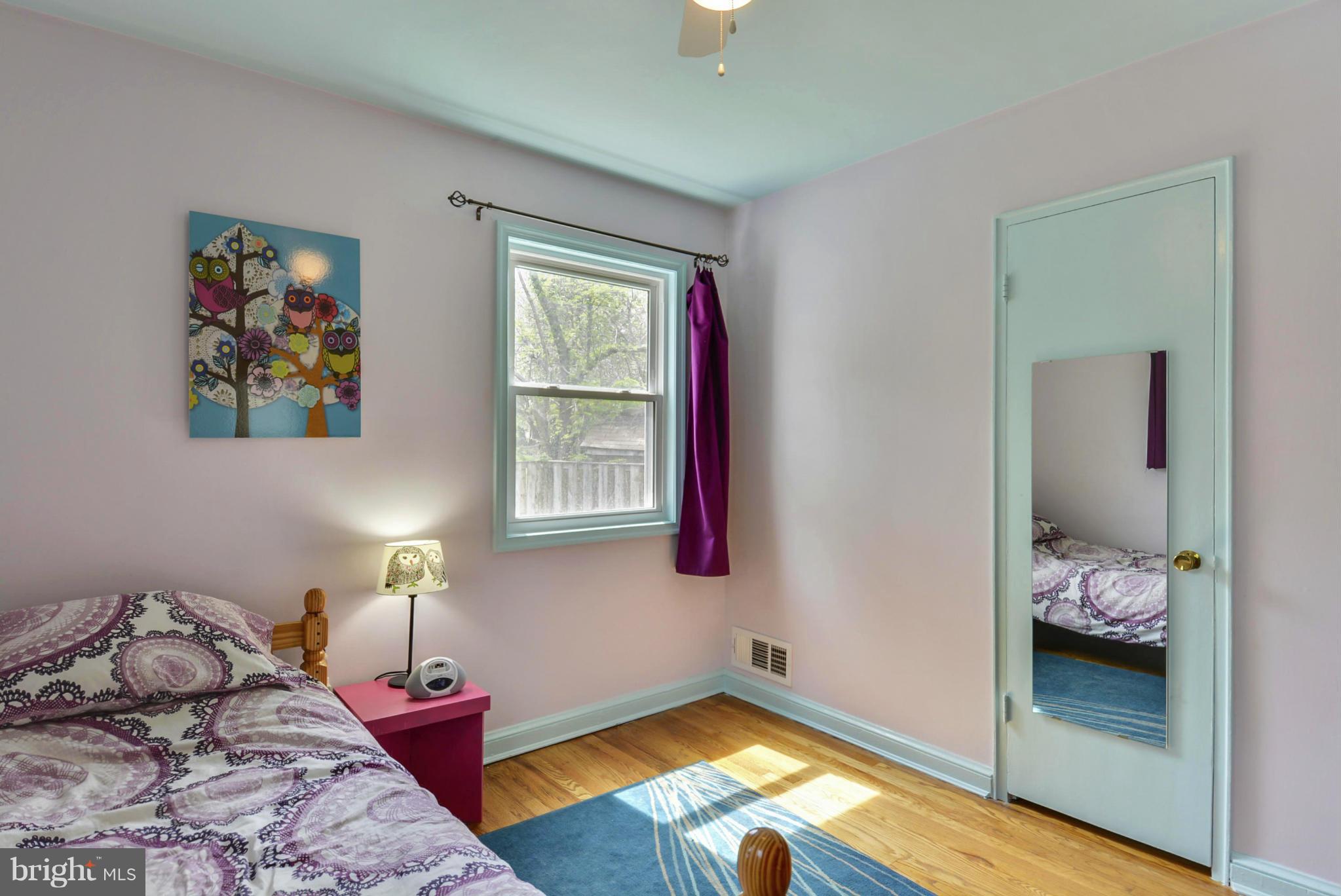 501 Royalton Road Silver Spring, MD 20901 - Photo 17 of 29 a bedroom with bed and a window