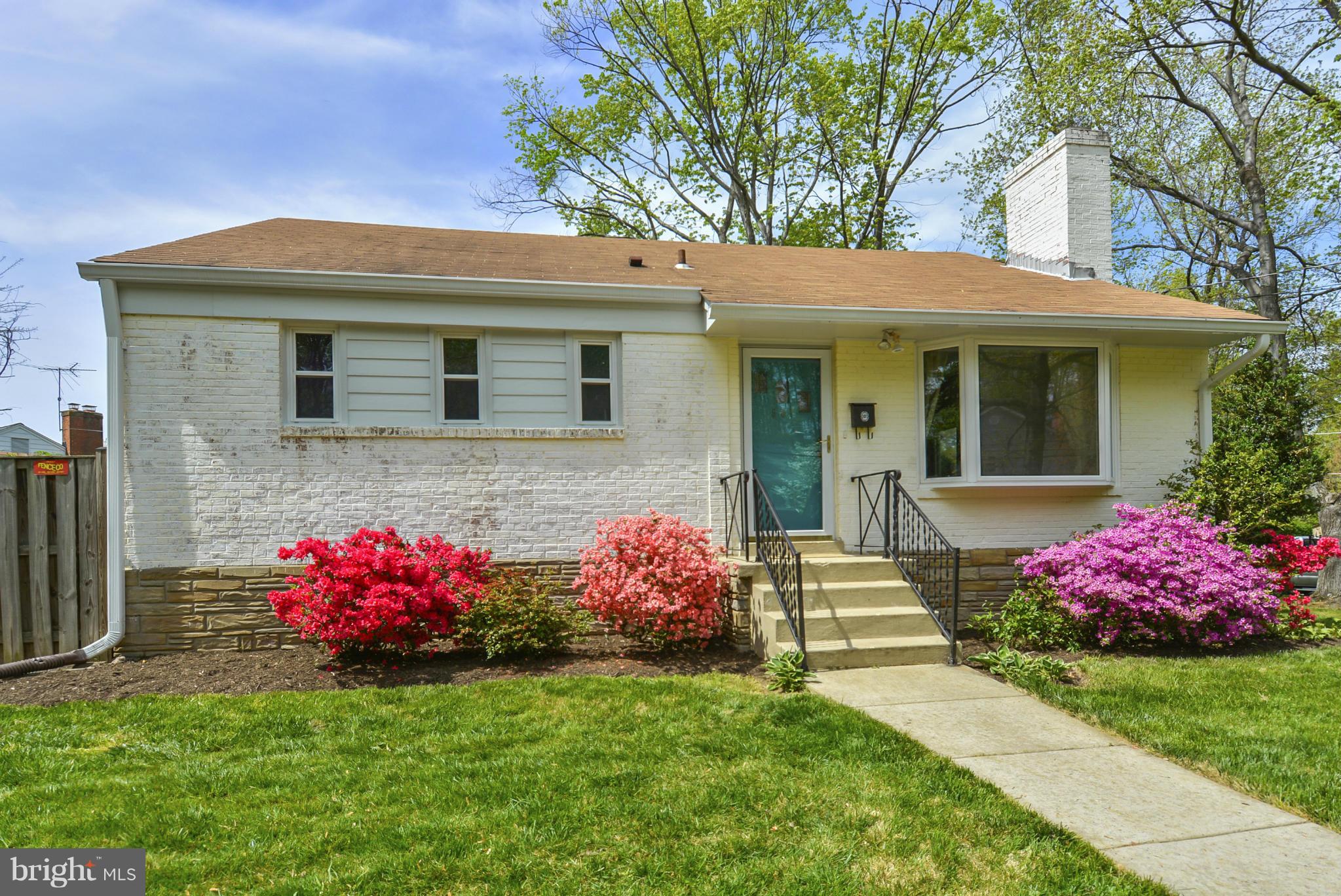 501 Royalton Road Silver Spring, MD 20901 - Photo 2 of 29 a front view of a house with a yard