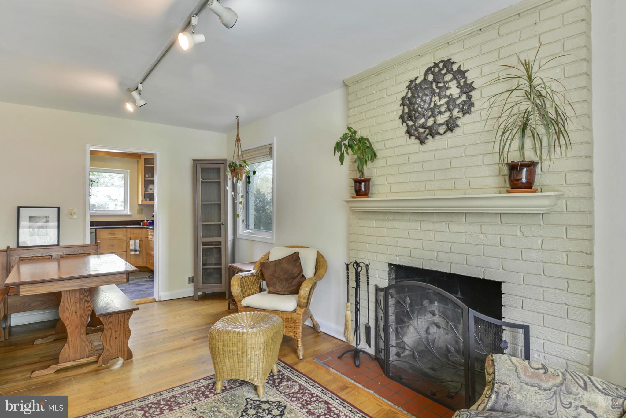 501 Royalton Road Silver Spring, MD 20901 - Photo 7 of 29 a living room with furniture and a fireplace
