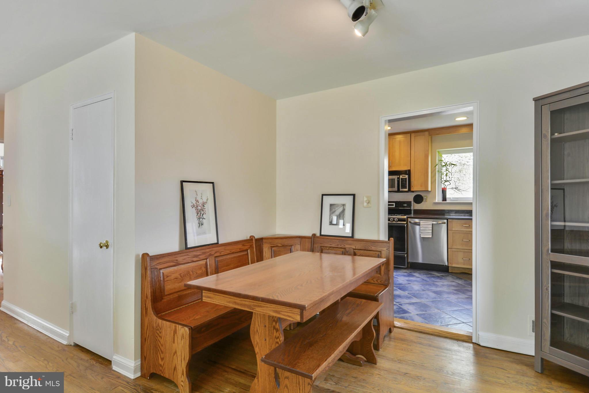 501 Royalton Road Silver Spring, MD 20901 - Photo 9 of 29 a view of a dining room with furniture and wooden floor