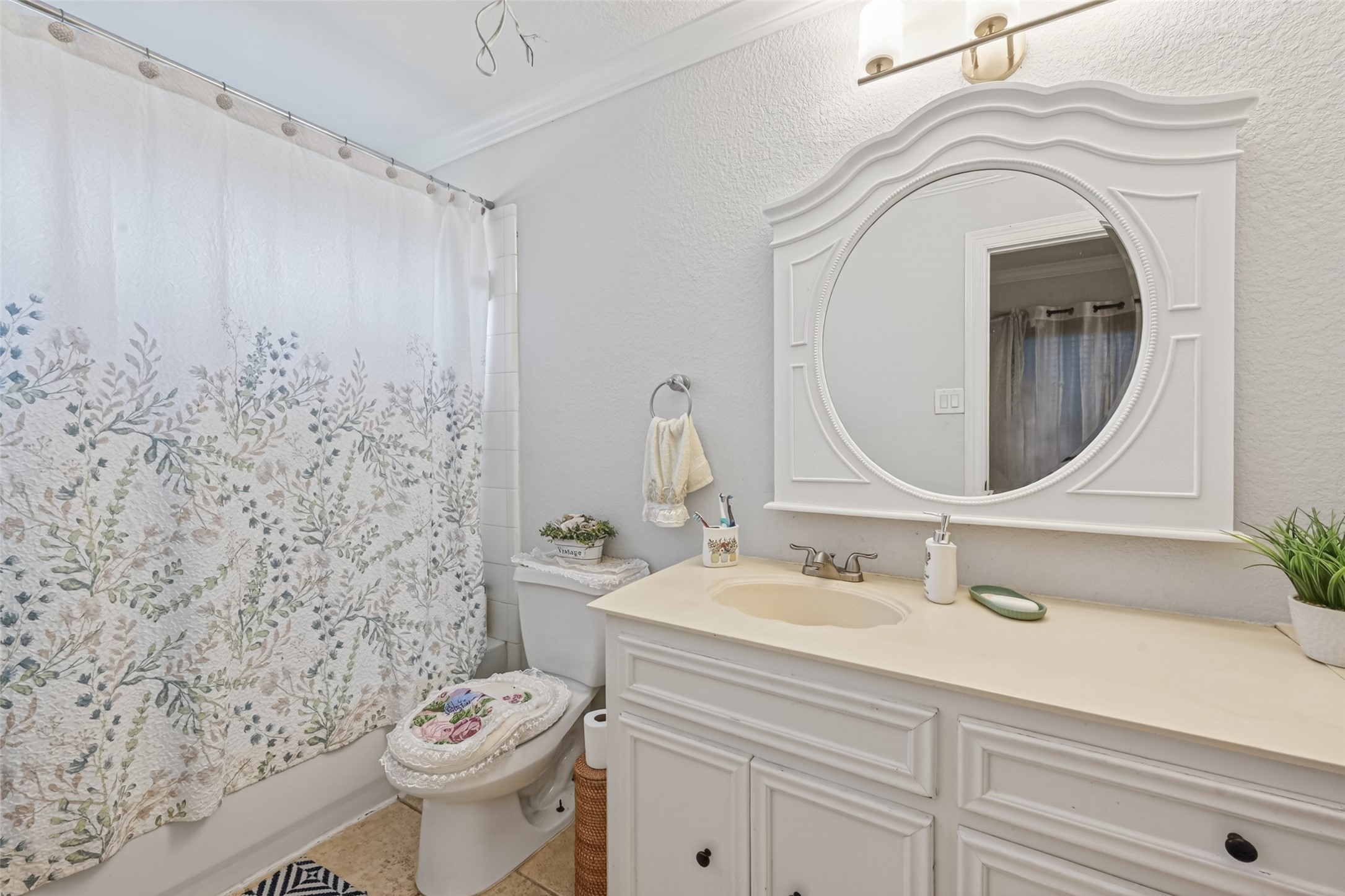 8023 Pool Hill Road Fulshear, TX 77441 - Photo 40 of 50 a bathroom with a sink a toilet and a mirror