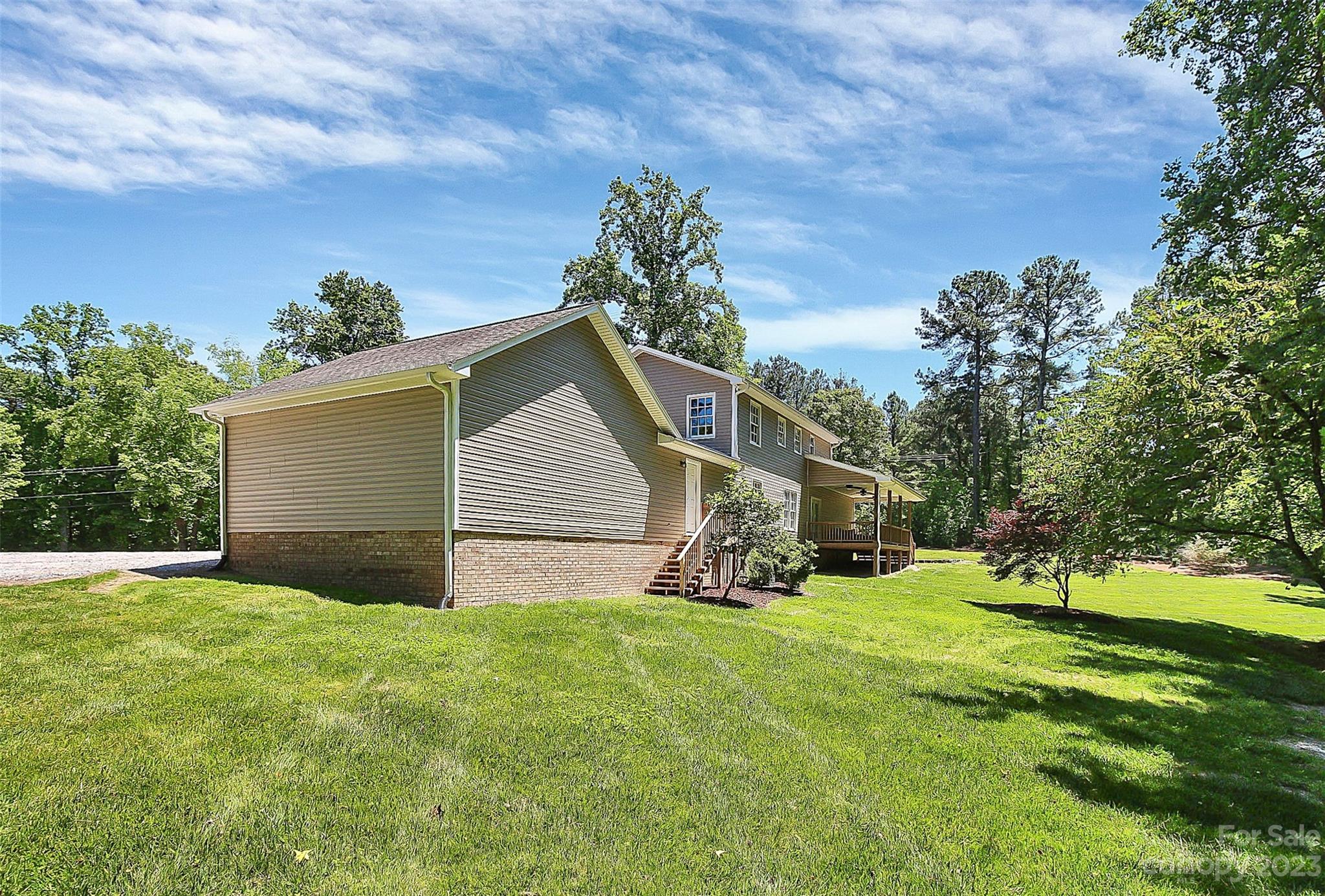 5218 Rehobeth Road Waxhaw, NC 28173 - Photo 26 of 35 a view of a house with a yard