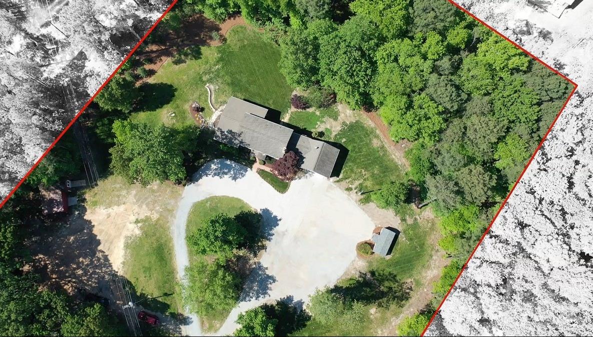 5218 Rehobeth Road Waxhaw, NC 28173 - Photo 35 of 35 an aerial view of a house with a yard