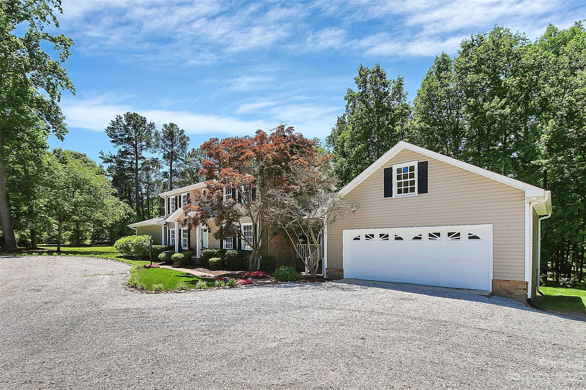 5218 Rehobeth Road Waxhaw, NC 28173 - Photo 6 of 35 a view of a house with a yard and garage