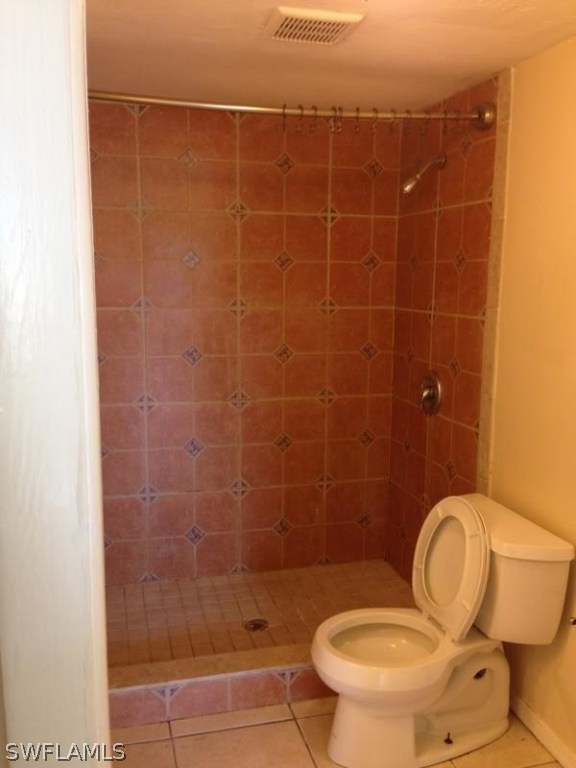 8162 Country Road, Unit 104 Fort Myers, FL 33919 - Photo 10 of 13 a bathroom with a toilet and a shower