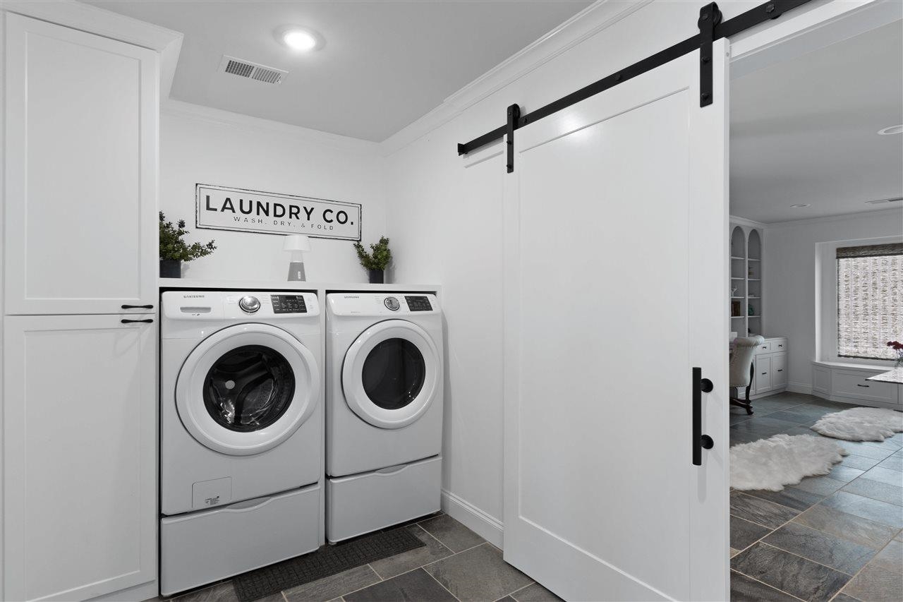 1911 Brierbrook Road Germantown, TN 38138 - Photo 17 of 26 a utility room with dryer and washer