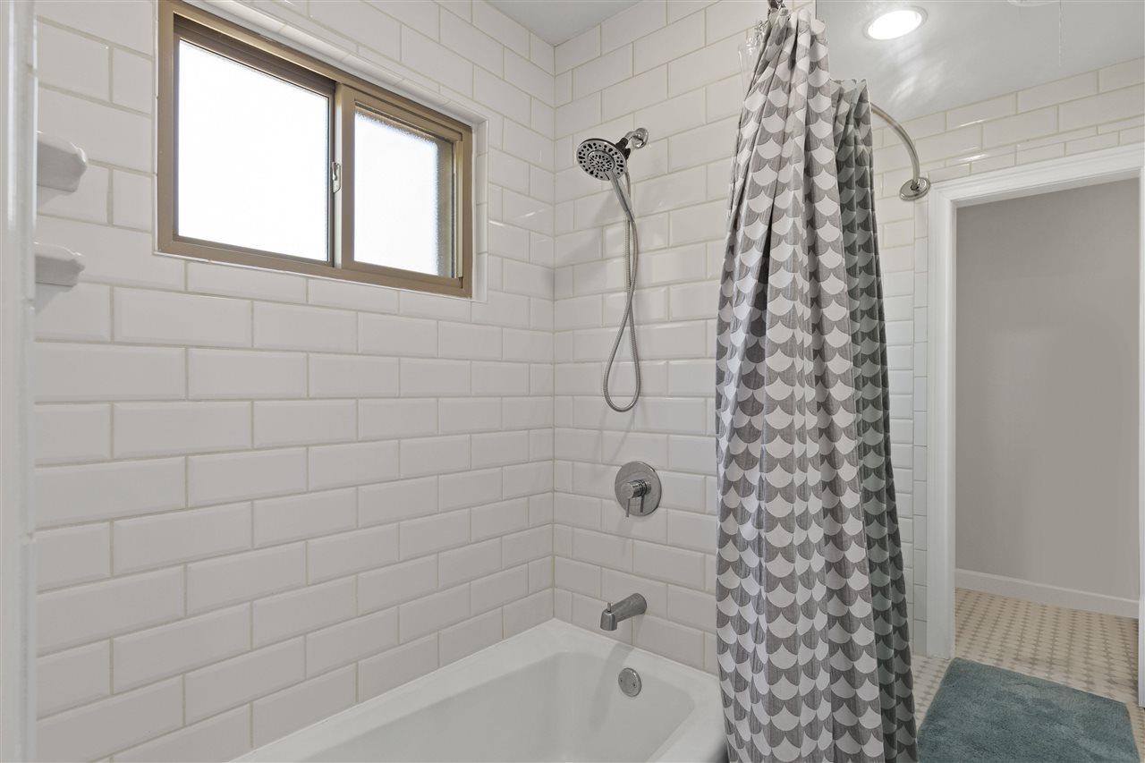 1911 Brierbrook Road Germantown, TN 38138 - Photo 21 of 26 a bathroom with a bathtub and shower