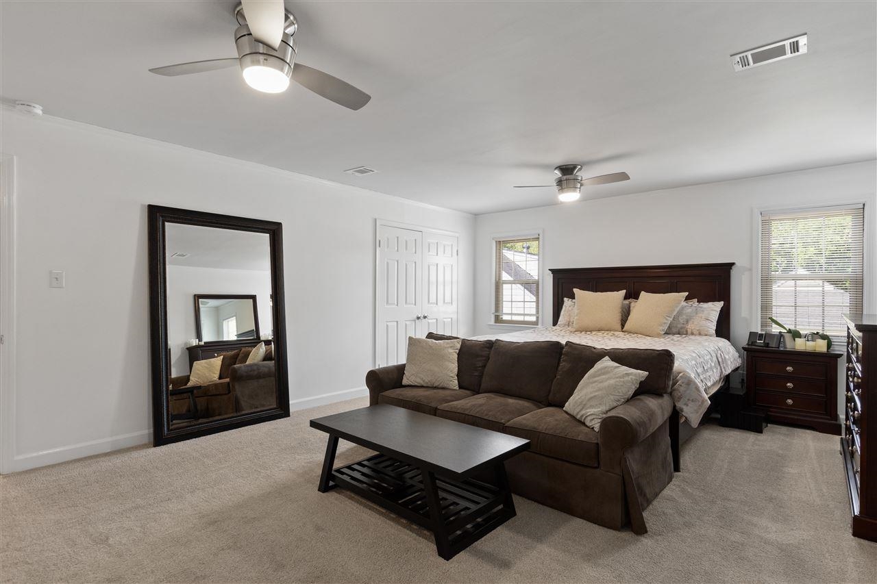 1911 Brierbrook Road Germantown, TN 38138 - Photo 24 of 26 a bedroom with a bed couch and a window